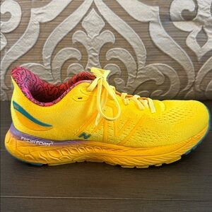 New Balance Yellow FreshFoam 880 Running shoe with Teal & Purple Accents
